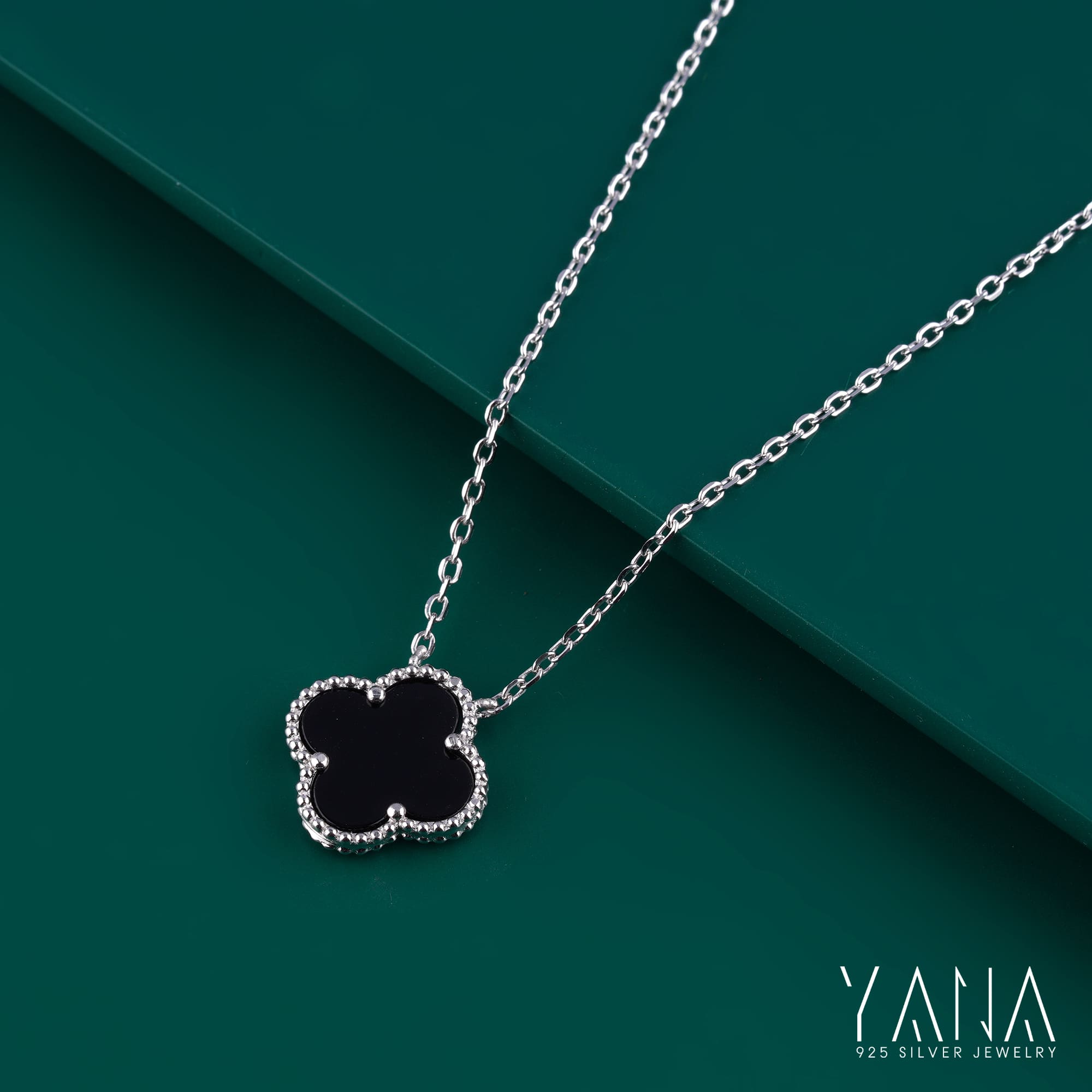 Black Moon Dust clover pendant in white gold plated chain